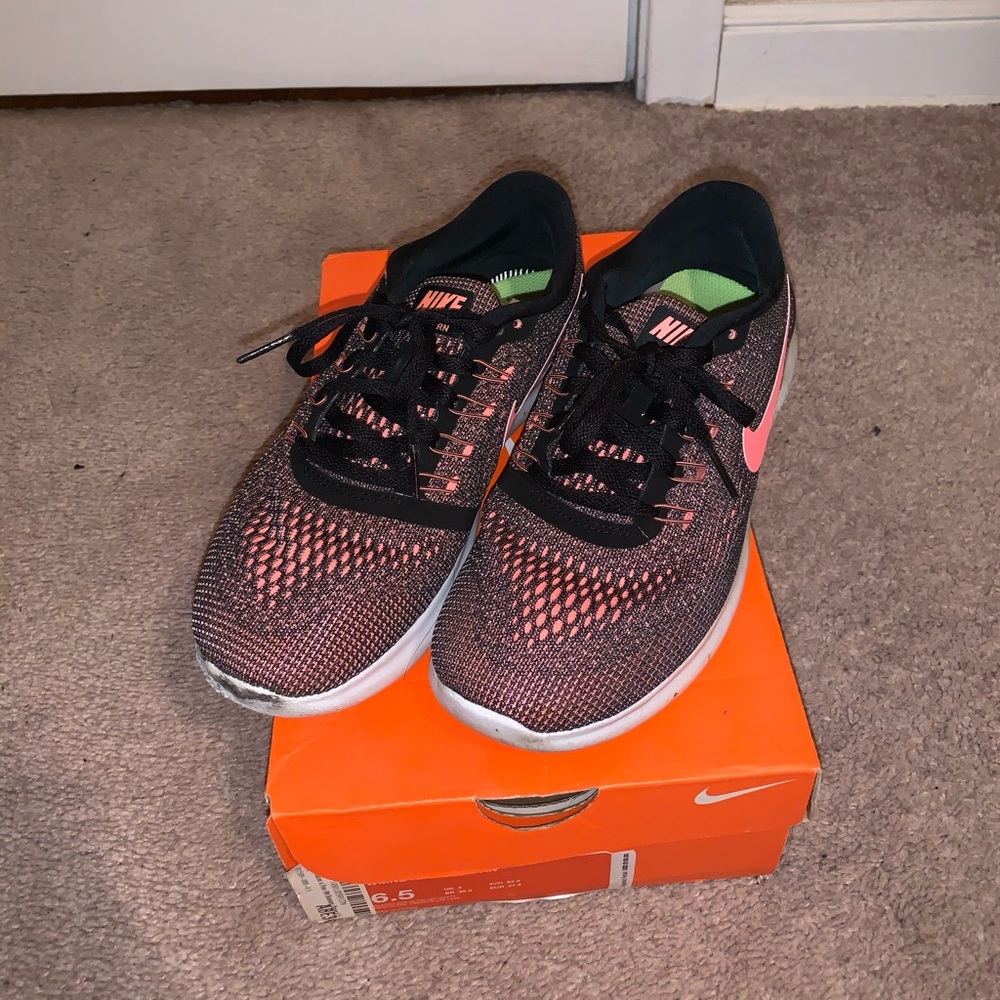 Pink nike running shoes